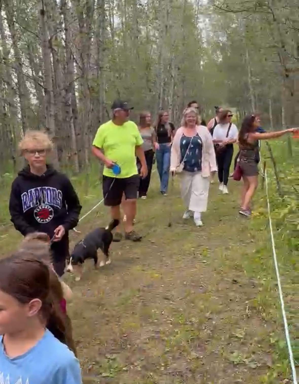 Families walking together along the Timber Forest trail during Timber Festival 2026